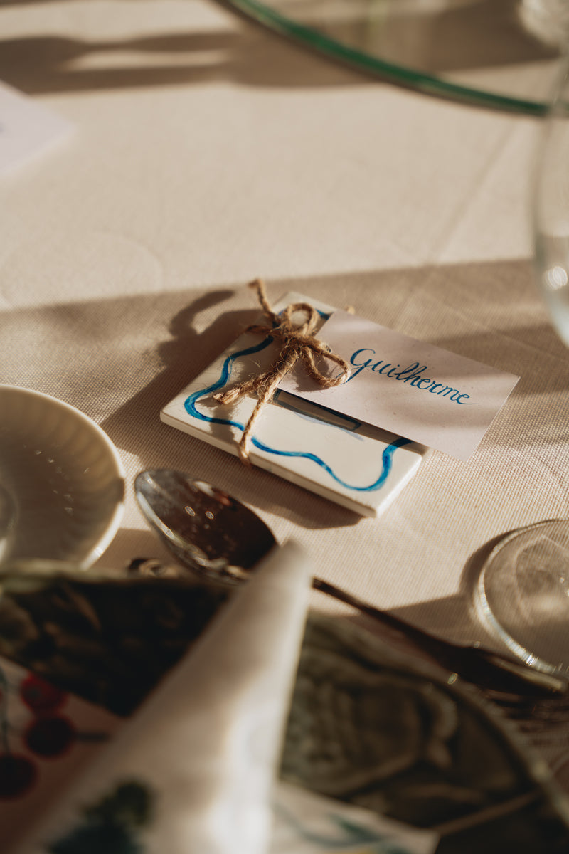 Personalized tile with a name tag on a table setting